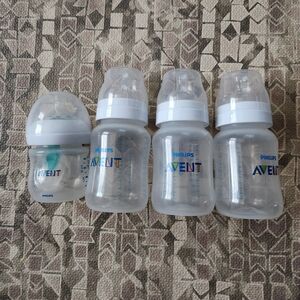 NWOB 1 125mL/4oz Bottle and 3 260mL/9oz Size 2 Anti-Colic Philips Avent Bottles
